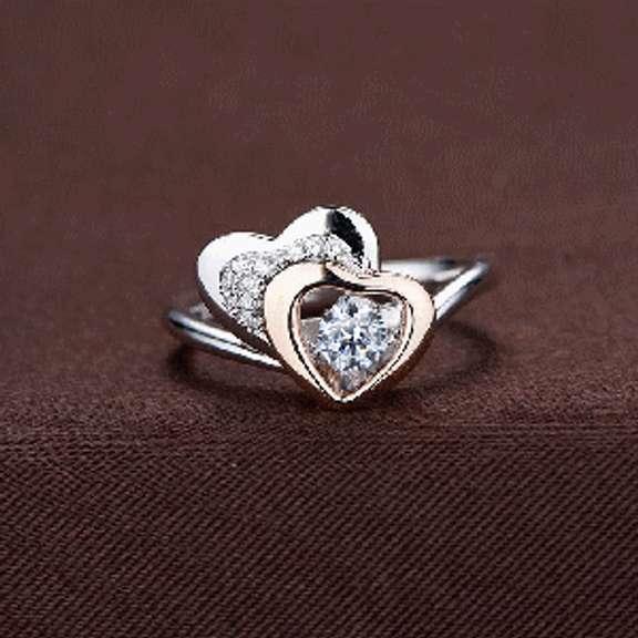 Our hearts Two tone Sterling Silver ring in dancing stone