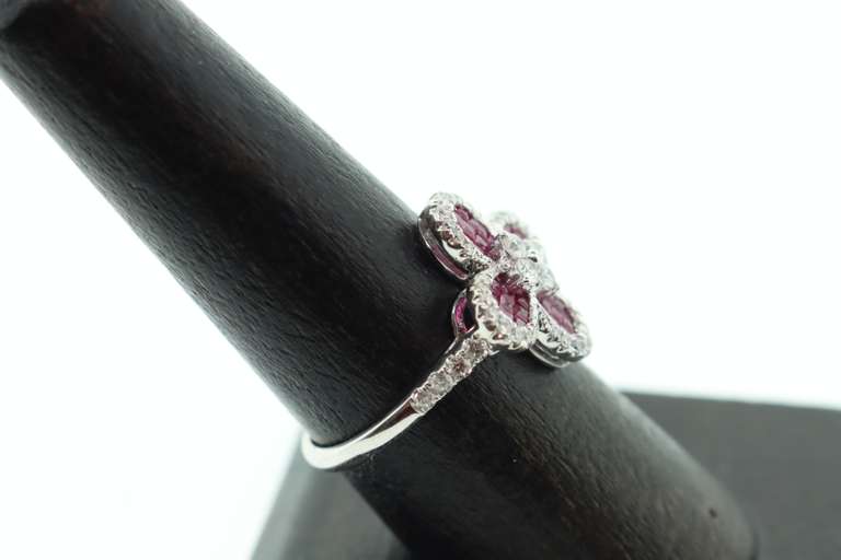 Alluring Red Ruby Floral Design 18k White Gold Ring rimmed with Diamonds