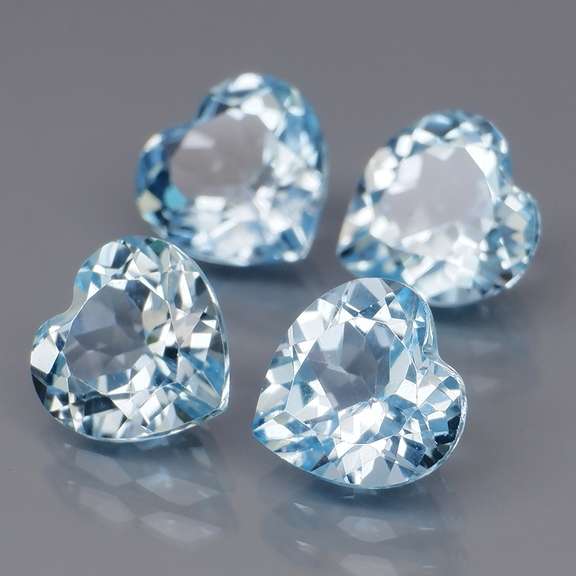 Superb quality 8.72ct 4 piece sky blue Topaz set