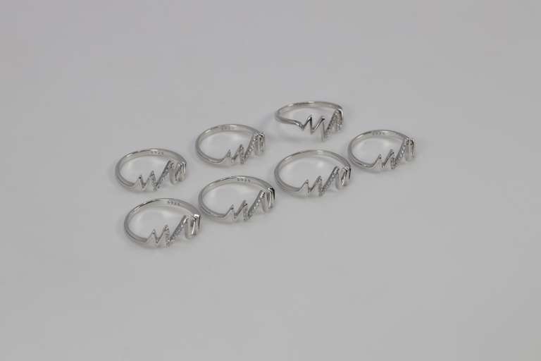 .925 Sterling Silver EKG Rings Lot of 40 Rings Various Sizes