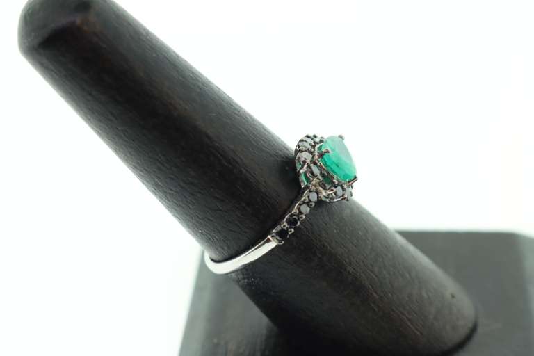 Melancholy Emerald Teardrop 18k White Gold Ring infused with Deep Black Diamonds