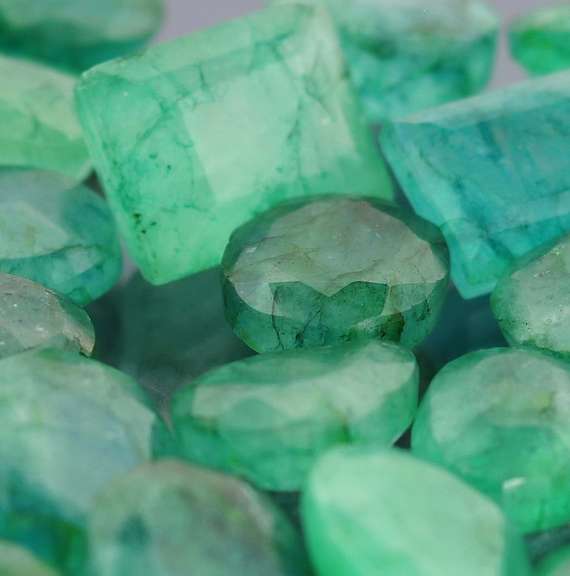 Heavy 243ct collection of Emeralds