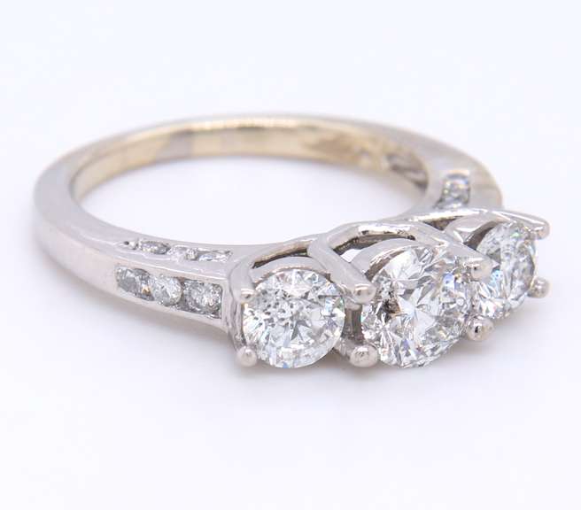 Incredible White Gold Channel Set accent 3 Diamond Ring