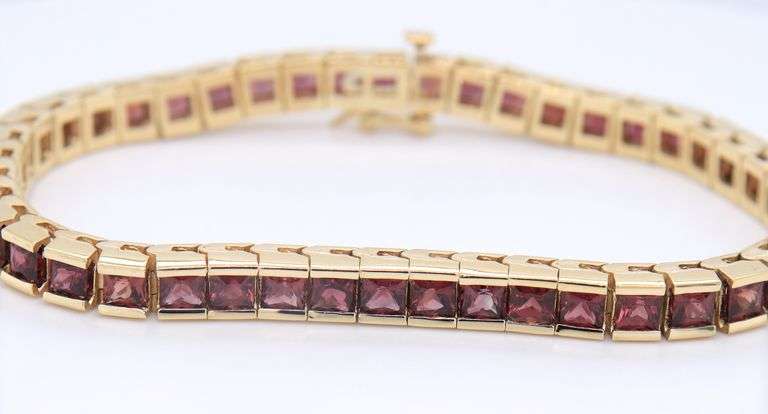 Attractive Yellow Gold Garnet Channel Set Bracelet
