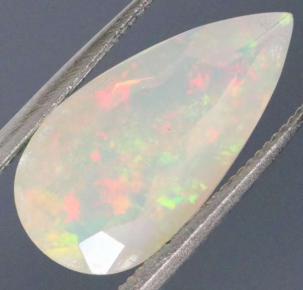 Wonderful glittering collectors 1.82ct faceted Jelly Opal