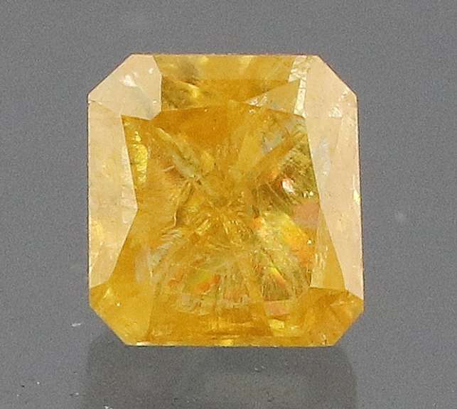 Stunning .28ct cushion cut golden Diamond