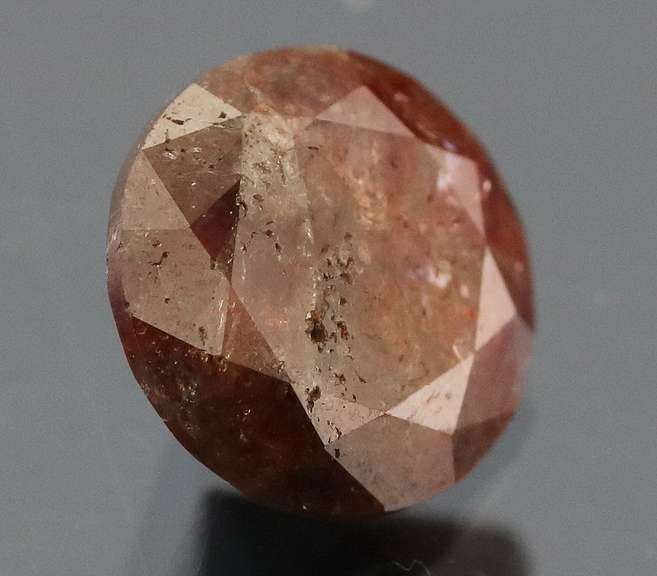 Eye catching 1.05ct round cut red Diamond solitaire