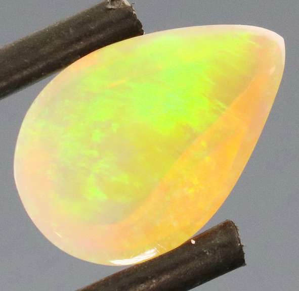Vivid flashing unheated 1.92ct Jelly Opal