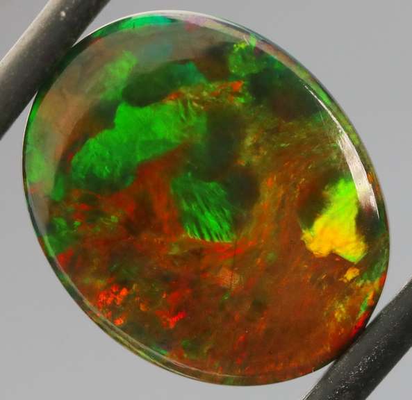 Magnificent 4.70ct full body flashing Semi Black Opal