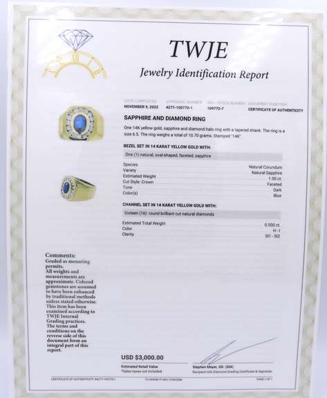 Handsome Yellow Gold oval Sapphire and Diamond Channel Halo Ring