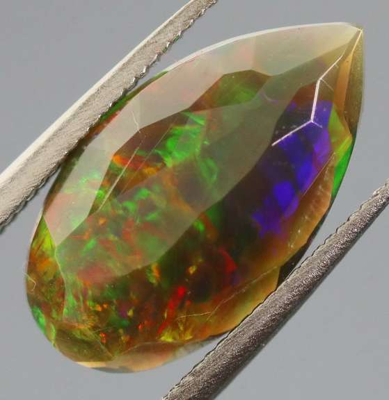 Exciting! 1.63ct floral fairy fire flashing Black Opal