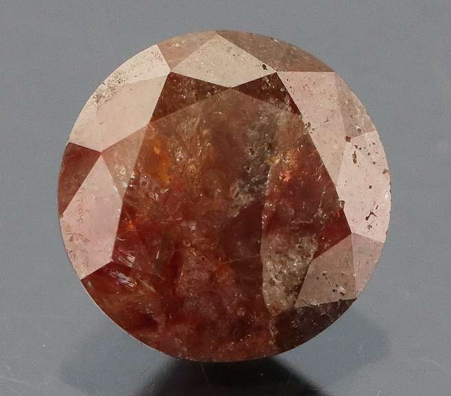 Eye catching 1.05ct round cut red Diamond solitaire