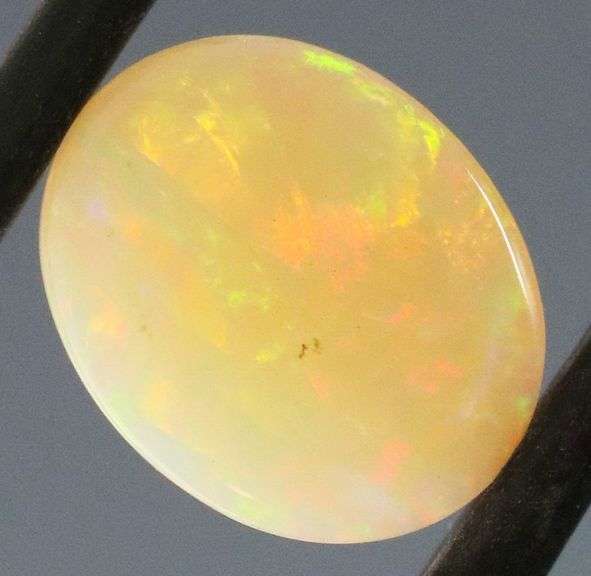 Brilliant flashing 1.83ct semi-black Opal