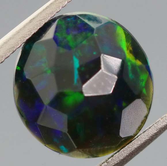 Glittering multi pattern flashing 1.84ct Welo black Opal