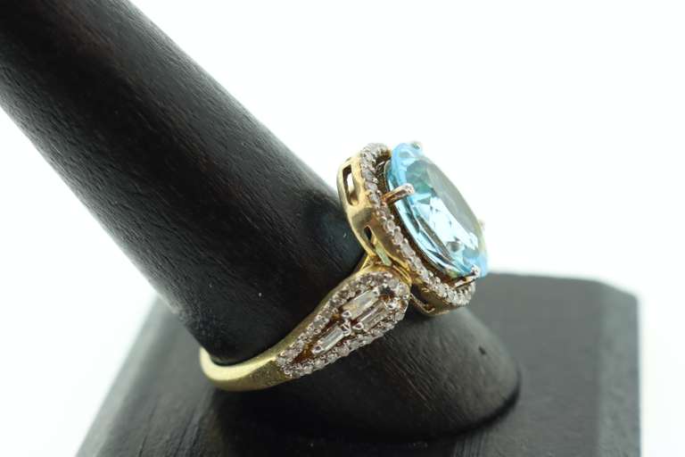 Charming Gold Plated Silver Topaz Ring with Diamond Accents