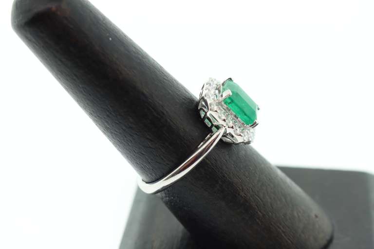 Stunning Emeral Halo Ring with Diamonds and an 18k Stamped White Gold Band