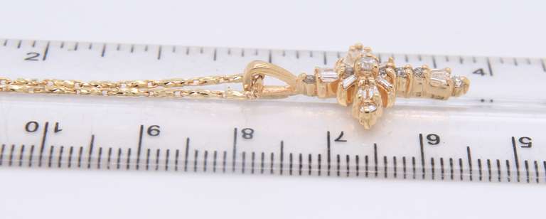 Wonderful Yellow Gold baguette Diamond Cross Pendant on Chain
