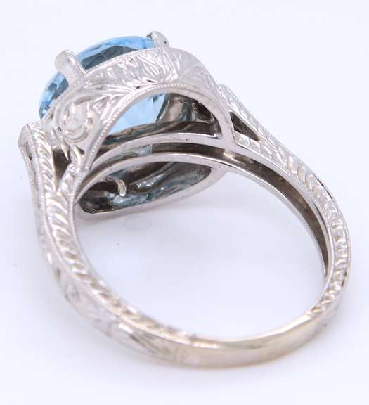 Wonderful White Gold Aquamarine and Diamond Halo Ring