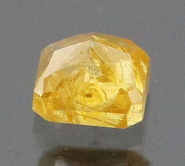 Stunning .28ct cushion cut golden Diamond