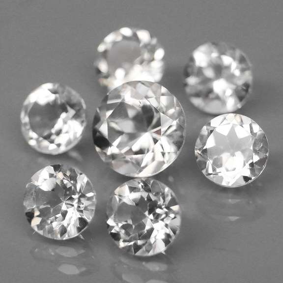 Mixed cut 7.65ct diamond white Topaz set