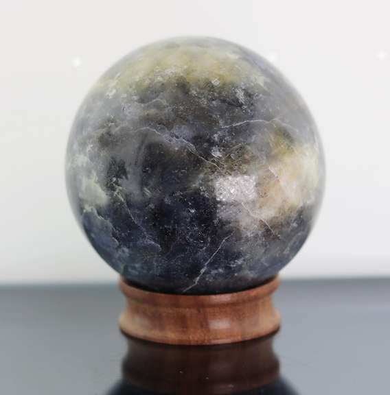 Tremendous 1,378ct sphere cut galaxy patterned Iolite