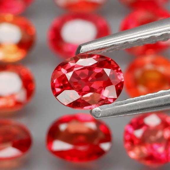 Brilliant 4.54ct fancy orange Songean Sapphire set