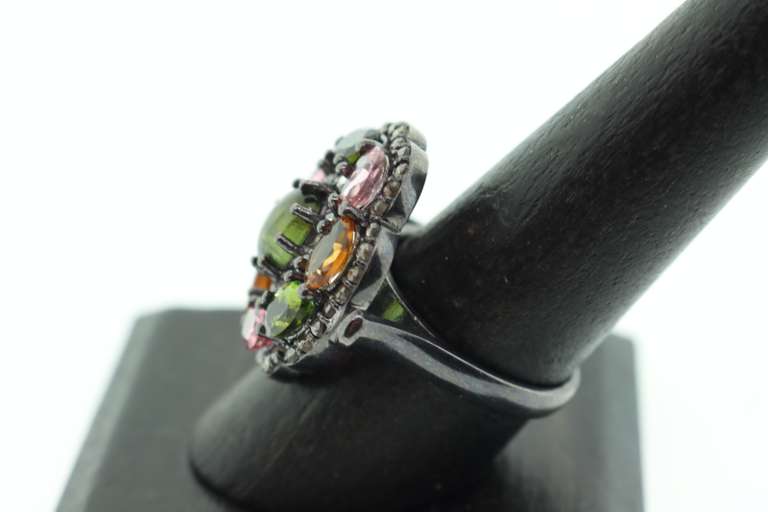 Beautiful Polychromatic Tanzanite Ring with Sterling Silver and Diamond Accents