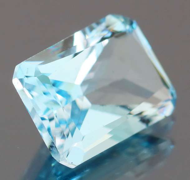 Vivid! 8.11ct emerald cut sky blue Topaz