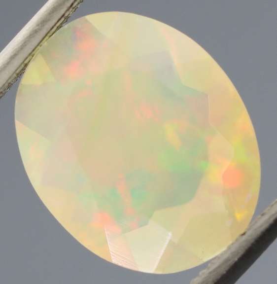Excellent glittering 1.88ct faceted Jelly Opal