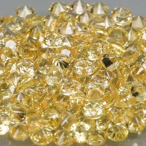 Fantastic 3.31ct diamond cut yellow Sapphire set