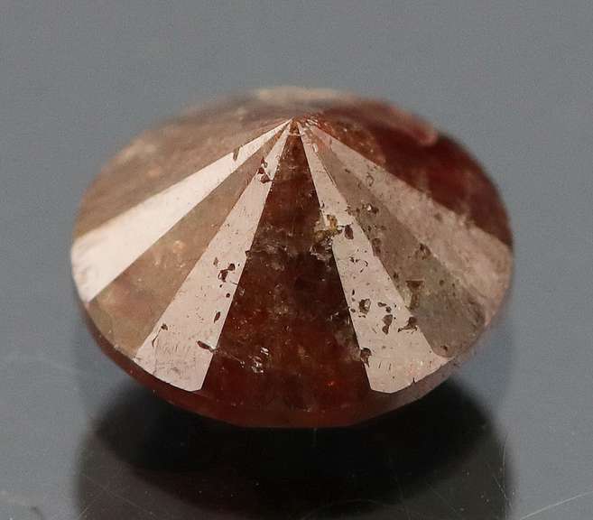 Eye catching 1.05ct round cut red Diamond solitaire
