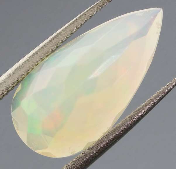 Wonderful glittering collectors 1.82ct faceted Jelly Opal
