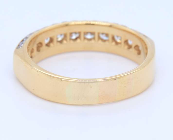 Elegant Yellow Gold 2.55ctw Channel Set Diamond Band