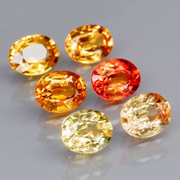 Brilliant 2.75ct fancy orange Songean Sapphire set