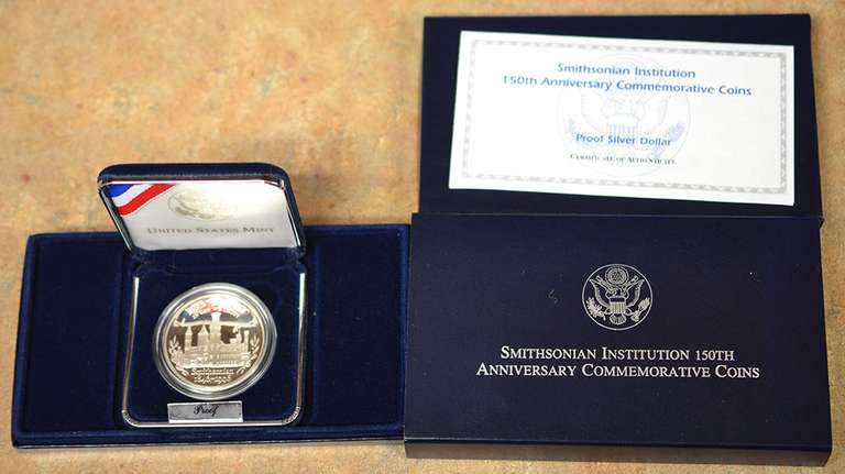 1996 Proof Smithsonian Institution 150th Anniversary Commemorative Silver Dollar.