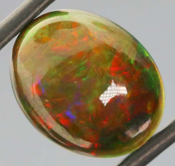 Magnificent 4.70ct full body flashing Semi Black Opal