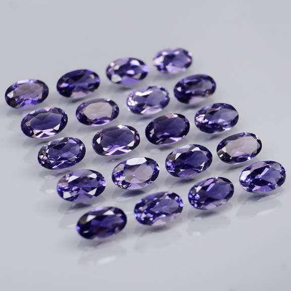 Stunning 4.08ct high luster blue violet Iolite set