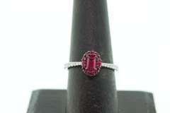 Exotic Crimson Ruby Halo Ring flanked with Diamonds on an 18k White Gold Band
