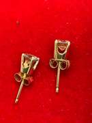 LADIES 14K GOLD AND DIAMOND STUDS.