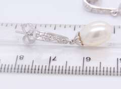 Charming White Gold Fresh Water Pearl and Diamond Dangle Earrings