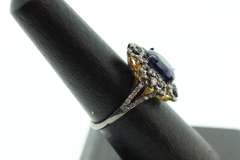 Impeccable Sapphire Ring with Intricate Diamond Studs on top Gold Plated Silver