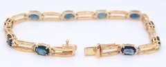 Attractive Yellow Gold Blue Sapphire and Diamond Tennis Bracelet