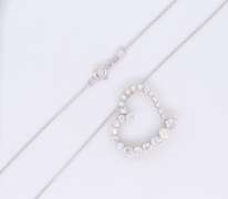 Dazzling White Gold Graduated Diamond Heart Shaped Pendant on Chain