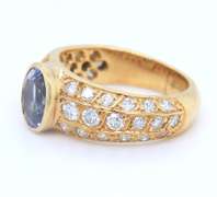 Powerful Yellow Gold oval Sapphire with Diamond Ring
