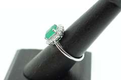 Stunning Emeral Halo Ring with Diamonds and an 18k Stamped White Gold Band