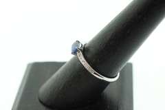 Phenominal Sapphire 18k White Gold Ring with Channel Set Diamonds