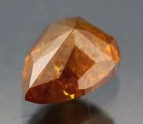 One of a kind! .37ct amber Diamond
