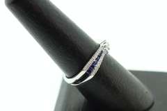 Flowing Channel Set 18k White Gold Sapphire and Diamond Ring with Triple-Stone Center