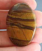 Dramatic 82.65ct Tiger Eye cabochon