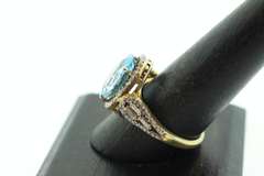 Charming Gold Plated Silver Topaz Ring with Diamond Accents